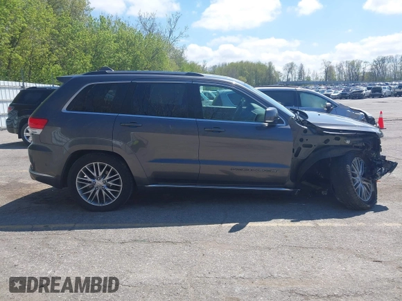 2017 Jeep Grand Cherokee Summit with VIN 1C4RJFJT9HC759417, listed as a IAAI auction lot 42199460 with 129,113 mi miles and . Bid and sale history available at DreamBid. Image 14.