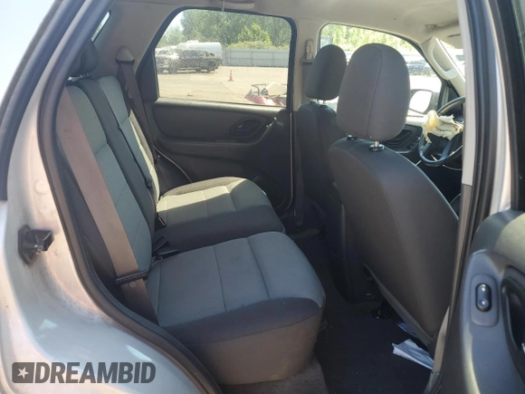 2005 Ford Escape XLS Value with VIN 1FMYU92Z55KC93604, listed as a Copart auction lot 60104145 with 86,788 mi miles and Salvage title. Bid and sale history available at DreamBid. Image 11.