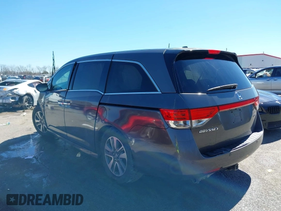 2016 Honda Odyssey Touring Elite with VIN 5FNRL5H97GB010275, listed as a IAAI auction lot 41655328 with Not Provided miles. Bid and sale history available at carsss.com. Image 3.