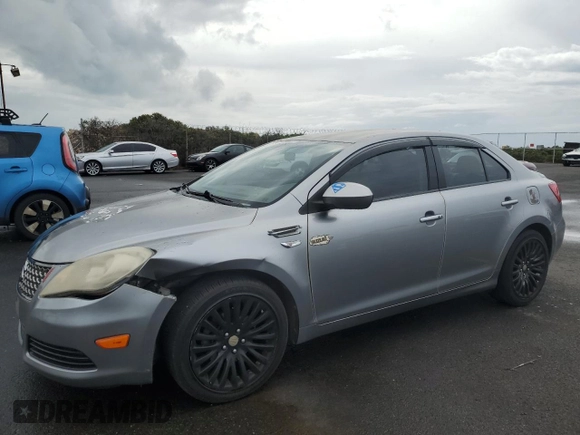 2011 Suzuki Kizashi SE z VIN JS2RE9A3XB6111196, wystawiony jako Copart lot #48076635 z przebiegiem 113 569 mil mil oraz Szkody całkowita. Historia ofert i sprzedaży dostępna na DreamBid. Obrazek 1.