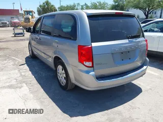 2016 Dodge Grand Caravan SE with VIN 2C4RDGBG9GR385847, listed as a IAAI auction lot 42042755 with 32,613 mi miles and . Bid and sale history available at DreamBid. Image 3.