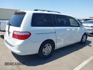 2005 Honda Odyssey EX with VIN 5FNRL38465B081716, listed as a IAAI auction lot 41998956 with 173,182 mi miles and . Bid and sale history available at carsss.com. Image 4.