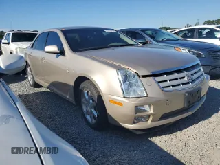 2006 Cadillac STS with VIN 1G6DC67A660194412, listed as a Copart auction lot 69878774 with 140,675 mi miles and Salvage Title. Bid and sale history available at DreamBid. Image 4.