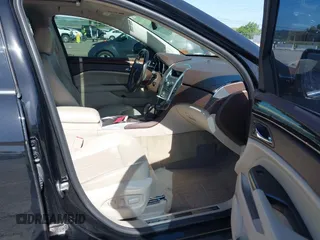 2012 Cadillac SRX Performance Collection with VIN 3GYFNBE39CS656702, listed as a IAAI auction lot 39599535 with 110,860 mi miles and . Bid and sale history available at DreamBid. Image 5.