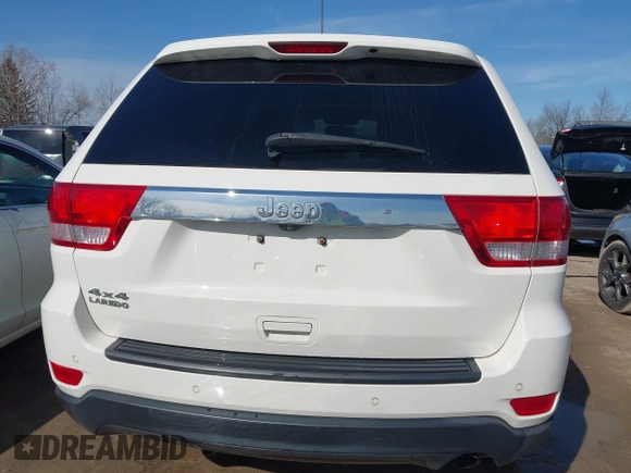 2012 Jeep Grand Cherokee Laredo with VIN 1C4RJFAG6CC279427, listed as a IAAI auction lot 41956034 with 86,689 mi miles. Bid and sale history available at carsss.com. Image 16.