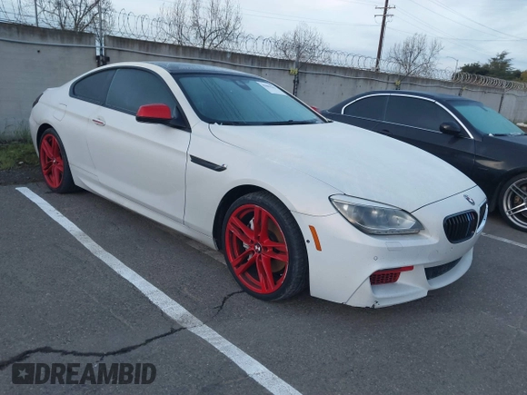 2013 BMW 6 Series 650i with VIN WBAYM9C57DDW20312, listed as a IAAI auction lot 41861212 with 98,662 mi miles and . Bid and sale history available at carsss.com. Image 1.