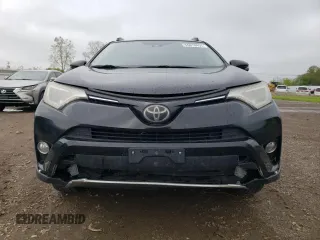 2018 Toyota RAV4 XLE with VIN 2T3WFREV0JW484430, listed as a Copart auction lot 55878455 with 132,335 mi miles and Salvage title. Bid and sale history available at DreamBid. Image 5.