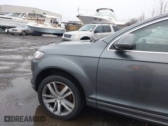 2015 Audi Q7 3.0T Premium Plus with VIN WA1LGAFE7FD013891, listed as a IAAI auction lot 41819325 with 999,999 mi miles. Bid and sale history available at carsss.com. Image 6.