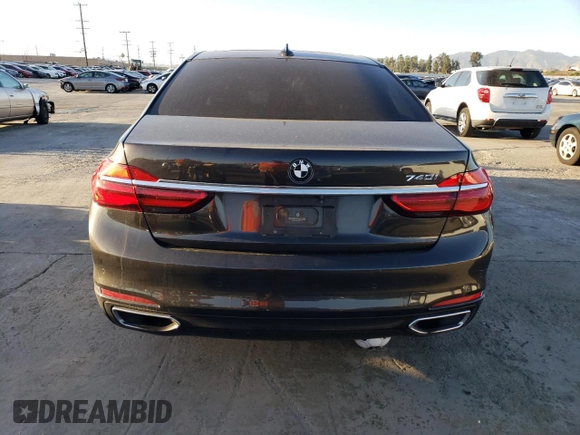 2016 BMW 7 Series 740i with VIN WBA7E2C59GG504533, listed as a Copart auction lot 77122283 with 68,209 mi miles. Bid and sale history available at carsss.com. Image 6.