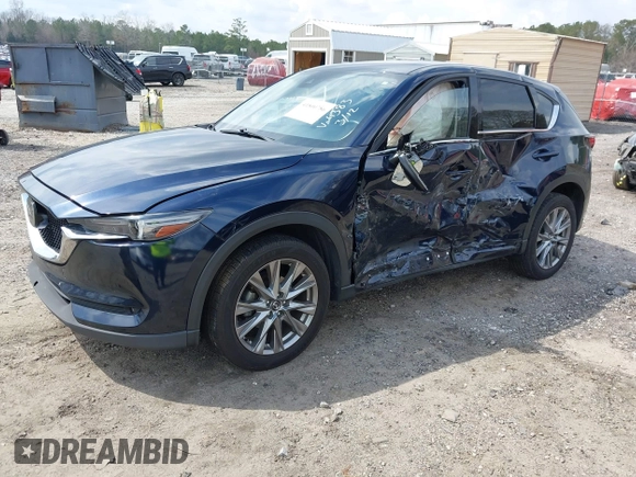 2021 Mazda CX-5 Grand Touring with VIN JM3KFBDM8M0484383, listed as a IAAI auction lot 41800786 with 58,617 mi miles. Bid and sale history available at carsss.com. Image 17.