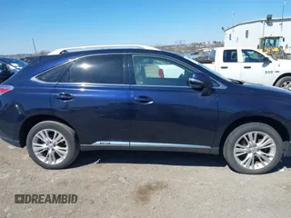 2010 Lexus RX 450h with VIN JTJBC1BA6A2009915, listed as a IAAI auction lot 41903210 with 190,013 mi miles and . Bid and sale history available at carsss.com. Image 13.