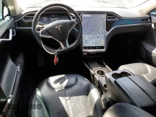2014 Tesla Model S 60 z VIN 5YJSA1H17EFP36595, wystawiony jako Copart lot #53705035 z przebiegiem 148 254 mil mil oraz Szkoda całkowita • Salvage title. Historia ofert i sprzedaży dostępna na DreamBid. Obrazek 8.