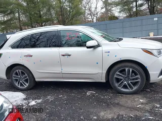 2019 Acura MDX Sport Hybrid w/Advance Pkg with VIN 5J8YD7H77KL000596, listed as a IAAI auction lot 41540974 with 89,378 mi miles. Bid and sale history available at carsss.com. Image 13.