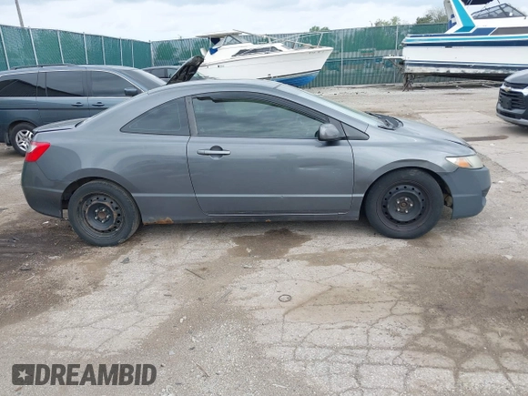 2010 Honda Civic Cpe LX with VIN 2HGFG1B65AH525017, listed as a IAAI auction lot 42142779 with 0 mi miles. Bid and sale history available at carsss.com. Image 4.