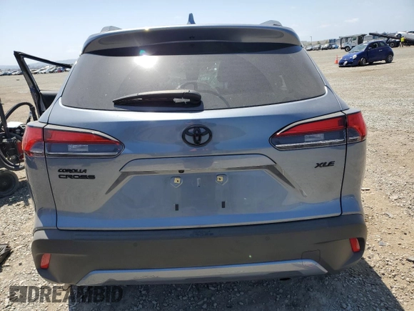 2022 Toyota Corolla Cross XLE with VIN 7MUEAAAG3NV012240, listed as a Copart auction lot 54125225 with 16,204 mi miles and Salvage title. Bid and sale history available at DreamBid. Image 6.