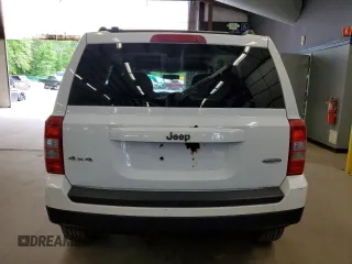 2014 Jeep Patriot Latitude with VIN 1C4NJRFB3ED766143, listed as a Copart auction lot 57879215 with 145,733 mi miles and Clean title. Bid and sale history available at DreamBid. Image 6.