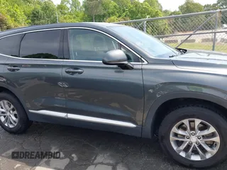 2019 Hyundai Santa Fe SEL Plus z VIN 5NMS33AD0KH134674, wystawiony jako IAAI lot #42133493 z przebiegiem 55 175 mil mil oraz . Historia ofert i sprzedaży dostępna na DreamBid. Obrazek 13.