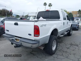 2003 Ford F-350 XL z VIN 1FTSW31P53ED77760, wystawiony jako IAAI lot #41656643 z przebiegiem 176 489 mil mil oraz . Historia ofert i sprzedaży dostępna na DreamBid. Obrazek 4.