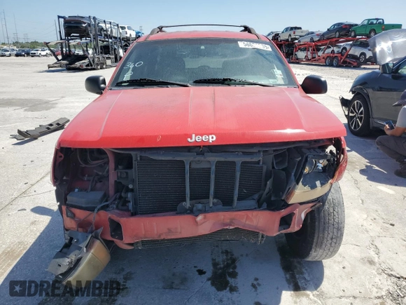 1999 Jeep Grand Cherokee Laredo z VIN 1J4G258SXXC518308, wystawiony jako Copart lot #56636235 z przebiegiem 233 649 mil mil oraz Szkoda całkowita • Salvage title. Historia ofert i sprzedaży dostępna na DreamBid. Obrazek 5.