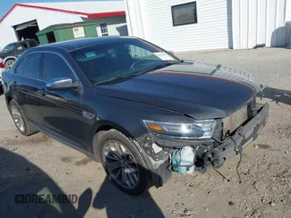 2017 Ford Taurus Limited z VIN 1FAHP2F80HG114953, wystawiony jako IAAI lot #41527680 z przebiegiem 170 897 mil mil oraz . Historia ofert i sprzedaży dostępna na DreamBid. Obrazek 1.