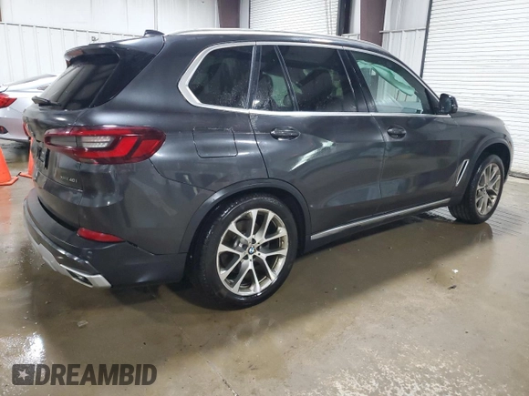 2020 BMW X5 xDrive40i with VIN 5UXCR6C09L9C51165, listed as a Copart auction lot 58212555 with Not provided miles and Salvage title. Bid and sale history available at DreamBid. Image 3.