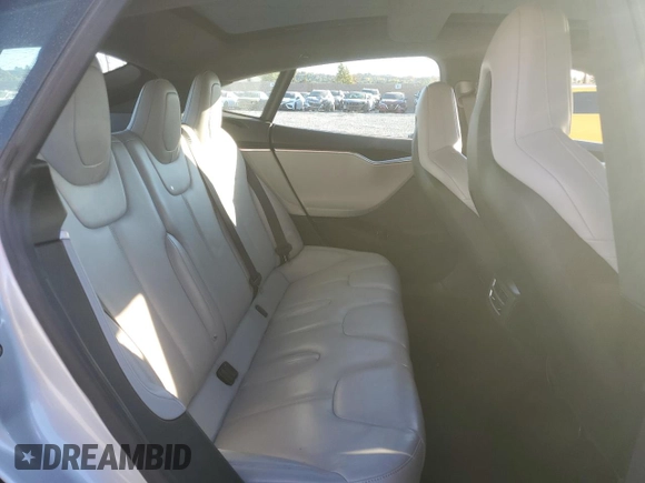2016 Tesla Model S 90D with VIN 5YJSA1E26GF147974, listed as a Copart auction lot 82815404 with 126,609 mi miles and Salvage Title. Bid and sale history available at DreamBid. Image 11.