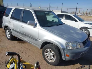 1998 Honda CR-V EX with VIN JHLRD1863WC074582, listed as a IAAI auction lot 41702456 with 243,674 mi miles. Bid and sale history available at carsss.com. Image 1.