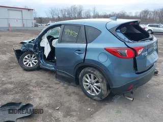 2016 Mazda CX-5 Touring with VIN JM3KE4CY8G0858045, listed as a IAAI auction lot 41941537 with 103,532 mi miles. Bid and sale history available at carsss.com. Image 3.