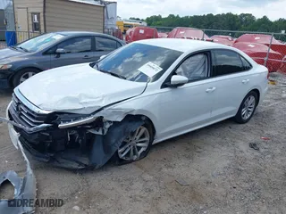2020 Volkswagen Passat 2.0T S with VIN 1VWAA7A35LC012759, listed as a IAAI auction lot 39909072 with 50,690 mi miles. Bid and sale history available at carsss.com. Image 2.