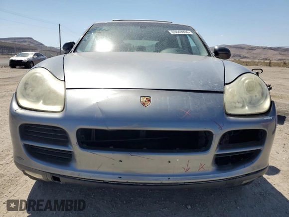 2004 Porsche Cayenne S with VIN WP1AB29P94LA66110, listed as a Copart auction lot 65849994 with 97,984 mi miles and Salvage Title. Bid and sale history available at carsss.com. Image 5.