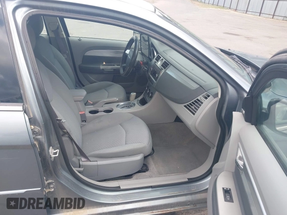 2007 Chrysler Sebring Touring z VIN 1C3LC56R17N521091, wystawiony jako IAAI lot #42202185 z przebiegiem 128 726 mil mil oraz . Historia ofert i sprzedaży dostępna na DreamBid. Obrazek 5.