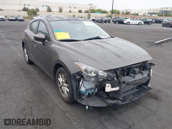2015 Mazda 3 i Touring with VIN JM1BM1L7XF1261134, listed as a IAAI auction lot 42164554 with 130,570 mi miles and . Bid and sale history available at DreamBid. Image 1.