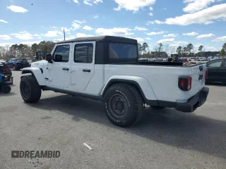 2023 Jeep Gladiator Sport S with VIN 1C6HJTAG4PL556387, listed as a Copart auction lot 47453305 with 35,611 mi miles and Salvage title. Bid and sale history available at DreamBid. Image 2.