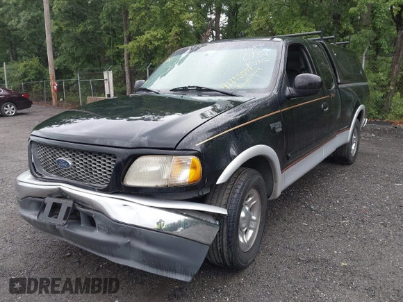 2000 Ford F-150 XL z VIN 1FTRX17L2YNB60131, wystawiony jako IAAI lot #42295537 z przebiegiem 216 638 mil mil oraz . Historia ofert i sprzedaży dostępna na DreamBid. Obrazek 17.