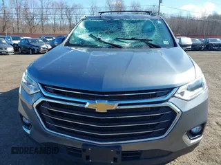 2021 Chevrolet Traverse LT Cloth with VIN 1GNEVGKW2MJ146411, listed as a IAAI auction lot 41694651 with 57,673 mi miles. Bid and sale history available at carsss.com. Image 12.