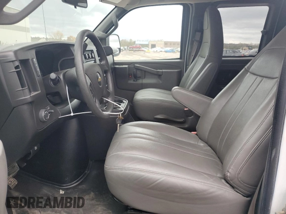 2019 Chevrolet Express Passenger LS с VIN 1GAZGNFG1K1363143, выставлен на аукционе Copart как лот 77474874 с пробегом 159 025 миль миль и Списание • Salvage title. История ставок и продаж доступна на DreamBid. Изображение 7.