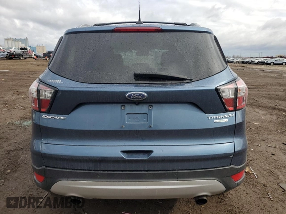 2018 Ford Escape Titanium with VIN 1FMCU0J91JUC57933, listed as a Copart auction lot 53152635 with 47,244 mi miles and Salvage title. Bid and sale history available at DreamBid. Image 6.