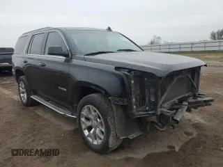 2018 GMC Yukon SLT with VIN 1GKS1BKC6JR389995, listed as a Copart auction lot 86239214 with 164,434 mi miles and Salvage Title. Bid and sale history available at carsss.com. Image 4.