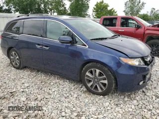 2016 Honda Odyssey Touring Elite with VIN 5FNRL5H98GB004677, listed as a Copart auction lot 59982165 with 119,341 mi miles and Clean title. Bid and sale history available at DreamBid. Image 4.