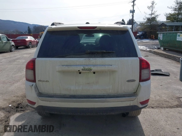 2015 Jeep Compass High Altitude Edition with VIN 1C4NJDEB9FD396239, listed as a IAAI auction lot 41451090 with 86,826 mi miles. Bid and sale history available at carsss.com. Image 16.