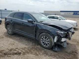2019 Mazda CX-9 Touring with VIN JM3TCBCY4K0300233, listed as a Copart auction lot 59424225 with 50,337 mi miles and Salvage title. Bid and sale history available at DreamBid. Image 4.