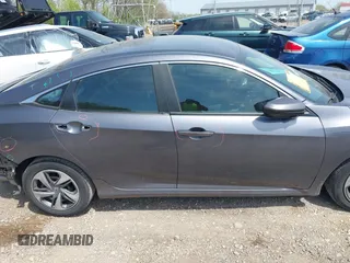 2020 Honda Civic LX z VIN 2HGFC2F69LH570685, wystawiony jako IAAI lot #42094908 z przebiegiem 40 000 mil mil oraz . Historia ofert i sprzedaży dostępna na DreamBid. Obrazek 13.