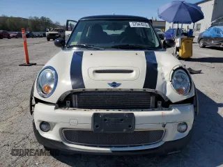 2009 MINI Hardtop S with VIN WMWMF73559TW83208, listed as a Copart auction lot 57347015 with 76,898 mi miles and Salvage title. Bid and sale history available at DreamBid. Image 5.
