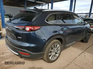 2018 Mazda CX-9 Grand Touring z VIN JM3TCADY2J0220873, wystawiony jako Copart lot #49264875 z przebiegiem Nie podano mil oraz Szkoda całkowita • Salvage title. Historia ofert i sprzedaży dostępna na DreamBid. Obrazek 3.