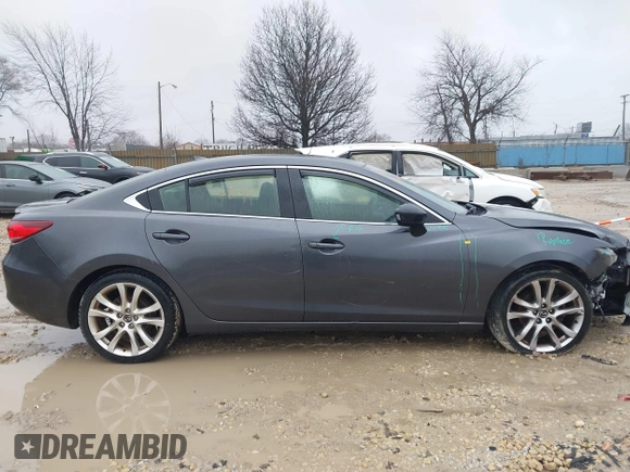 2015 Mazda 6 i Grand Touring with VIN JM1GJ1W56F1207077, listed as a IAAI auction lot 41734641 with 109,447 mi miles and . Bid and sale history available at DreamBid. Image 13.