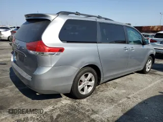 2011 Toyota Sienna LE AAS with VIN 5TDKK3DC6BS054847, listed as a Copart auction lot 64673975 with 197,266 mi miles and Salvage title. Bid and sale history available at DreamBid. Image 3.