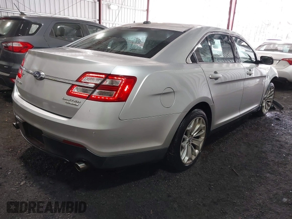 2014 Ford Taurus Limited with VIN 1FAHP2F81EG101351, listed as a IAAI auction lot 41662308 with 139,542 mi miles. Bid and sale history available at carsss.com. Image 4.