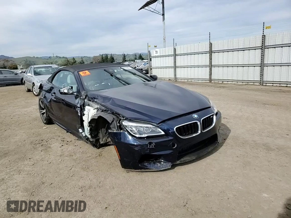 2016 BMW M6 z VIN WBS6G9C5XGD932039, wystawiony jako Copart lot #47433685 z przebiegiem 66 836 mil mil oraz Szkoda całkowita • Salvage title. Historia ofert i sprzedaży dostępna na DreamBid. Obrazek 13.
