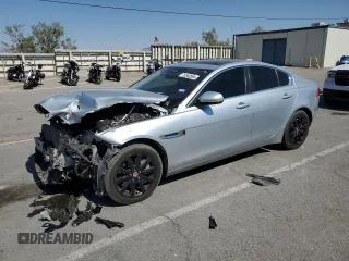 2019 Jaguar XE 25t with VIN SAJAR4FX6KCP49670, listed as a Copart auction lot 75340594 with 71,282 mi miles and Salvage Title. Bid and sale history available at carsss.com. Image 1.