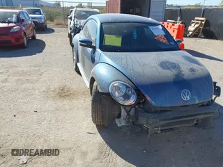 2019 Volkswagen Beetle S with VIN 3VWFD7AT7KM719095, listed as a IAAI auction lot 40919031 with 86,516 mi miles. Bid and sale history available at carsss.com. Image 1.